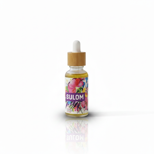 Hibiscus and Rose Hair Elixir with mirror reflection