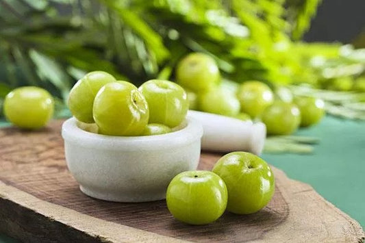 How to Use Amla for Thicker, Fuller Hair (and Darken Greys)